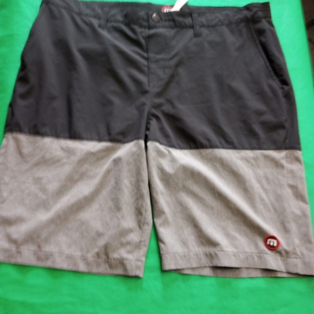 Travis Mathew Black Shorts with Red Logo